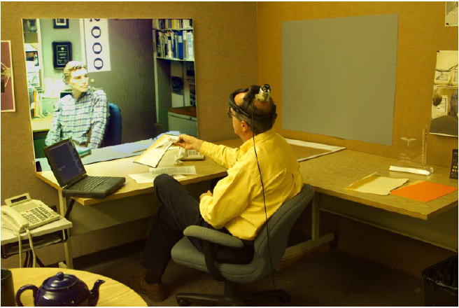 Toward a Compelling Sensation of Telepresence: Demonstrating a Portal to a Distant (Static) Office
