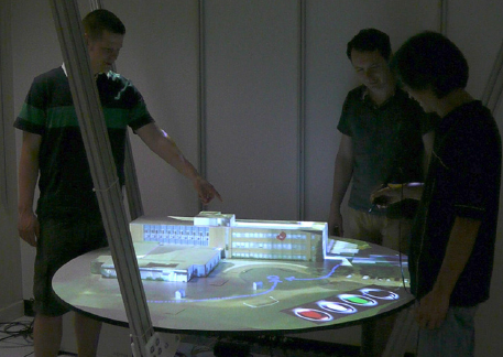 A Projector-based Physical Sand Table for Tactical Planning and Review