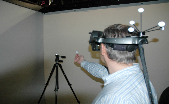 Geometric Calibration of Head-Mounted Displays and its Effects on Distance Estimation
